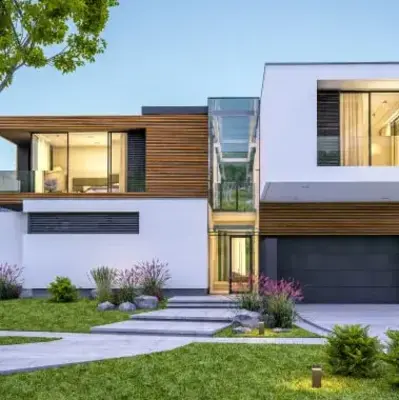 Modern house exterior featuring large windows and a spacious driveway.