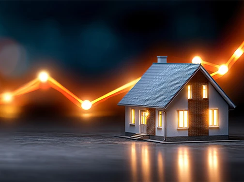 A house with a rising graph in front of a dark background, symbolizing growth in real estate or housing market trends.