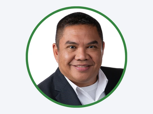 Headshot of Goosehead Agency Owner Sev Tamayo