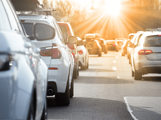 Cars stuck in traffic. 